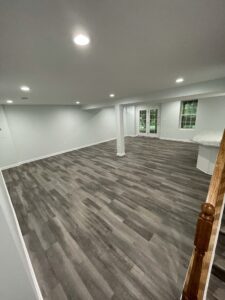 A dark brown flooring design for the basement