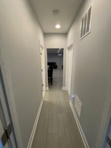 A white narrow hallway