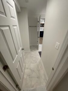 The white doorway to a room