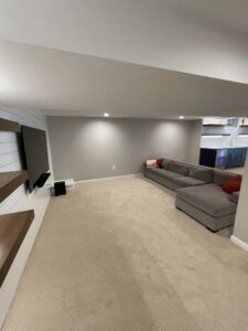 A furnished basement room