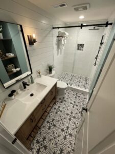 A view of the bathroom vanity and shower