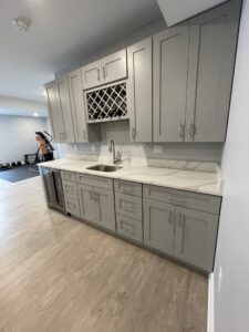 Gray cabinet doors and white countertops