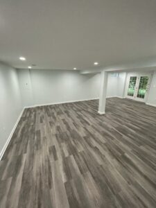A wide basement space and flooring