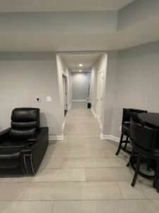 A long hallway of a basement