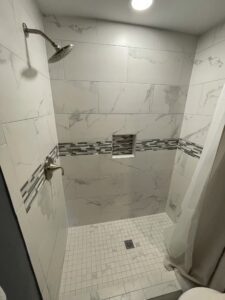 White and stripes design of a shower area