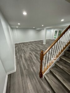 Dark brown flooring in the basement