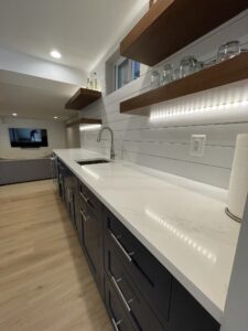 A kitchen countertop with lighting