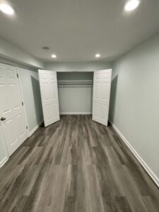 An opened closet in the bedroom