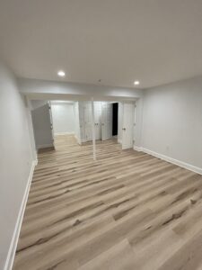 A wide basement space without furniture