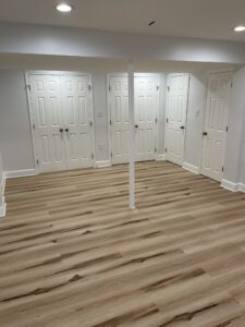 Multiple white doors in the basement